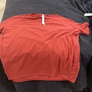 Never worn Back in Action short sleeve, beautiful rust color. Size 4